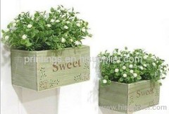 Heat transfer film for garden planters