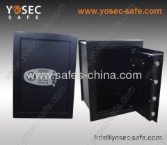 Hidden wall safe in wall with electronic safe lock and adjustable shelf inside