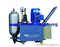 slide plate screen changer