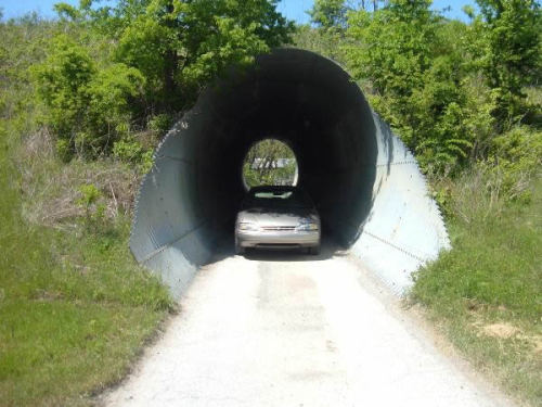 Structural plate pipe protecting and decorating the landscape