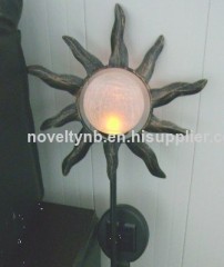 Solar wrought iron light