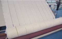 Automatic mattress roller machine