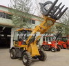 compact wheel loader with grass grapple