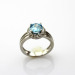 Fashion Jewelry 925 Silver Ring with 7mm Round Cut Blue Topaz and Clear Cubic Zircon