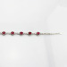 Sterling Silver Link Bracelet with 5x7mm Created Ruby Stones