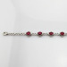 Sterling Silver Link Bracelet with 5x7mm Created Ruby Stones