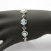 Fashion Jewelry 925 Silver Link Bracelet with 5x7mm Created Blue Topaz and Clear CZ Diamonds