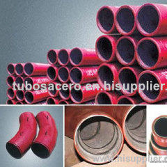 Abrasion resistant ceramic lined pipe