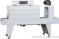 FILM SHRINK PACKAGING MACHINE