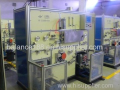 Optic fiber coloring and rewinding machine