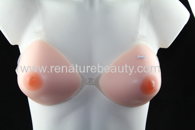 Strapped triangular silicone breast for cross dresser