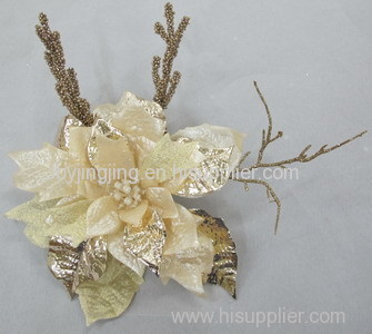 Silk poinsettia flower on a clip