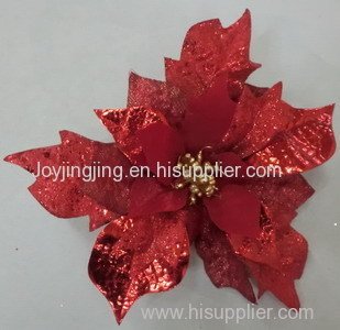 Silk poinsettia flower on a clip