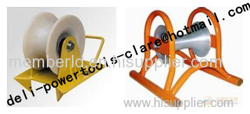 Laying cables in ducts - Cable guide and roller stand