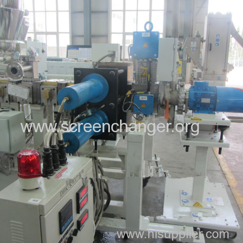 Double piston continuous screen changer for plastic extrusion machine