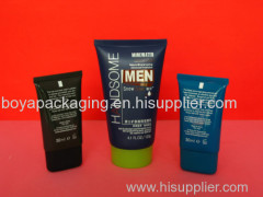 shiny plastic tube for hand cream with oval screw cap