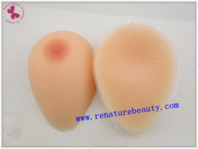 Lifelike skin and nipples for the artificial silicone breast form