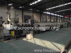 Hydraulic plate type screen changer for plastic sheet extruder