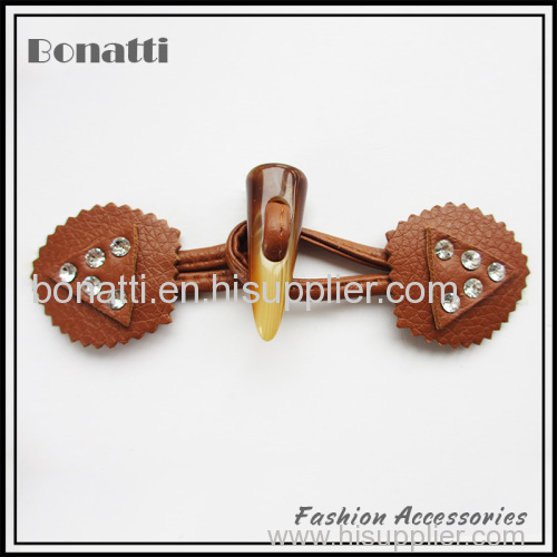leather frog and toggle button with rhinestone