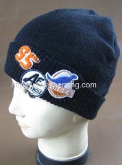 Double layer knitted hat with applique embroidery and towel embroidery