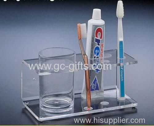 Clear acrylic toothbrush and tootpaste display rack