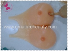 Silicone fake breast form with conjoint design for Cross dresser breast prosthesis