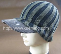 Stone knitted cap with woven fabric visor