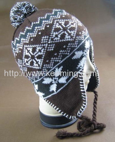 Snow flower jacquard hat with earflap and pompon,overlock on the edge