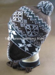 Snow flower jacquard hat with earflap and pompon,overlock on the edge