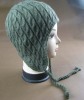 Cable needle earflap hat with part of fleece lining