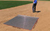 Hand drag mat makes ground and lawn maintenance easier