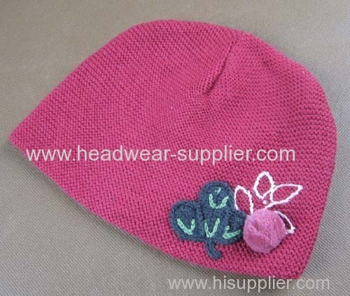 WOOLEN BABY HAT WITH HAND CROCHET FLOWER DECORATION