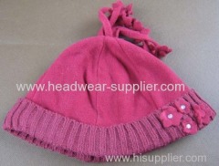 FLEECE HAT WITH KNITTED TURNUP AND FLOWER DECORATION