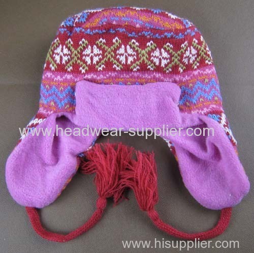 BABY JACQUARD EARFLAP AND ROOF HAT WITH THE BRIM ON THE FRONT