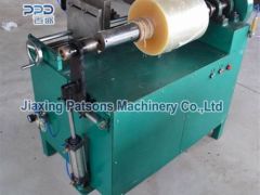 Cling film edge cutting machine