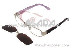 Optical frame with clip-on sunglasses