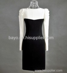 Women in black and white photograph goes all out hubble-bubble sleeve slimming long-sleeved dress