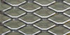 Expanded metal grill has high strength and no break or welds