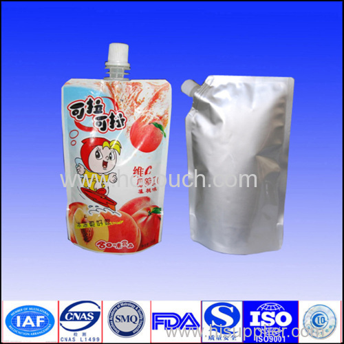 Liquid metalized stand up pouch with spout