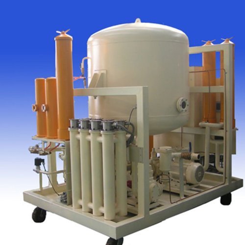 Vacuum oil purifier for solids water and gas removal