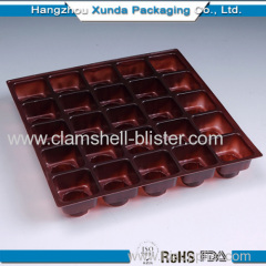 Blister plastic cavity tray for chocolate