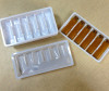 Plastic medication vial packaging trays