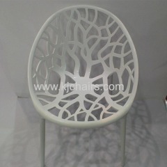 white plastic dining chair with armrest