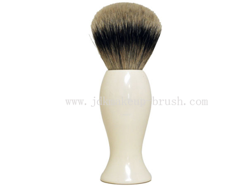 White colored handle shaving brush