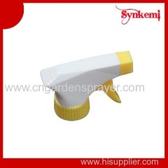 white and yellow trigger sprayer