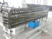 Hollow grid plate extrusion machine