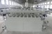 Hollow grid plate extrusion machine