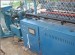 Double wire chain link fence machine