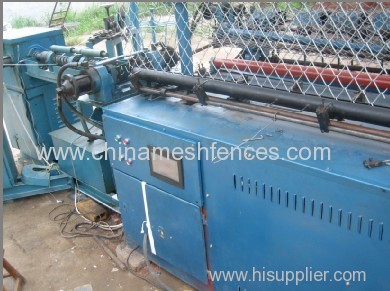 Double wire chain link fence machine