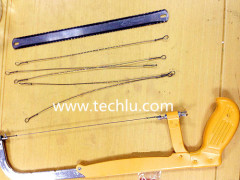 Adjustable steel hacksaw frame